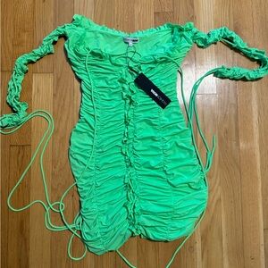 Green dress with opening in the front